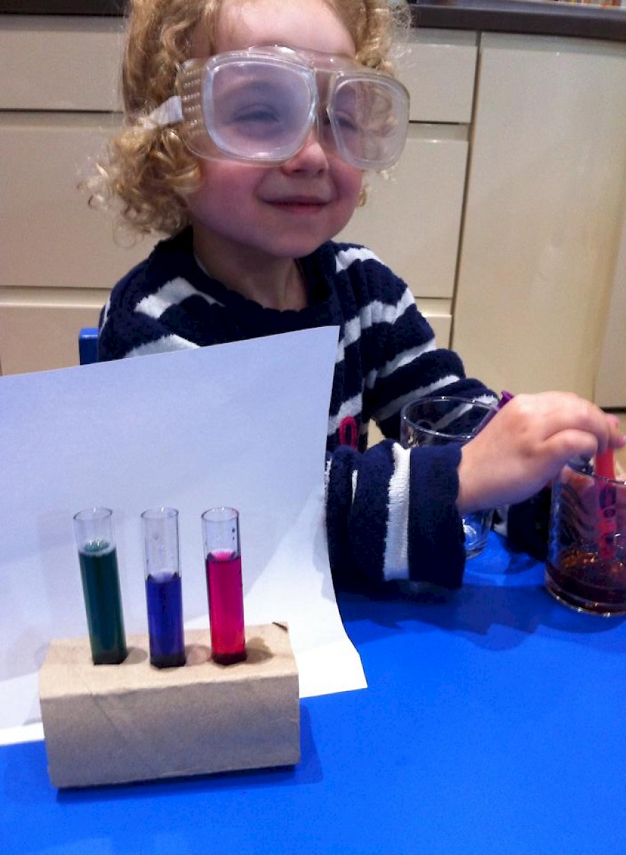 Test tubes filled with different coloured liquids